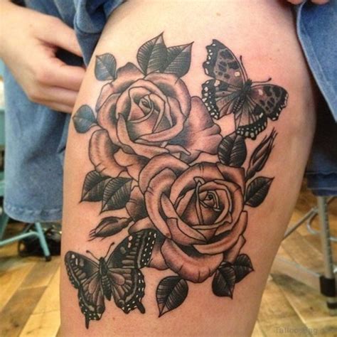 rose tattoo on thigh